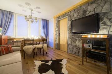 Фото номера Апартаменты с балконом Апартаменты Apartament Chałubińskiego г. Закопане 36