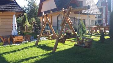 Фото номера Шале с 3 спальнями Шале Domek Anielci г. Закопане 22