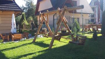Фото номера Шале с 3 спальнями Шале Domek Anielci г. Закопане 10