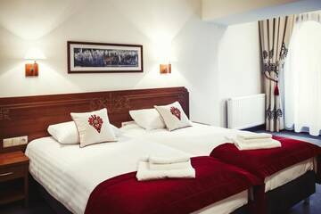 Фото номера Двухместный номер с 2 отдельными кроватями Отель Hotel Logos г. Закопане 16