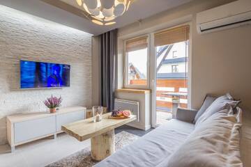 Фото номера Апартаменты с 1 спальней (для 2-4 взрослых) Апартаменты Apartamenty Krzeptowskiego Zakopane г. Закопане 2