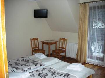 Фото номера Двухместный номер с 1 кроватью и балконом Проживание в семье Apartamenty U Lutnika Centrum Zakopane г. Закопане 4