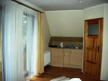 Фото номера Двухместный номер с 1 кроватью и балконом Проживание в семье Apartamenty U Lutnika Centrum Zakopane г. Закопане 3