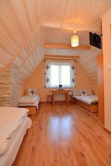 Фото номера Четырехместный номер Курортные отели Willa Tatra House г. Закопане 4