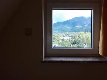 Фото номера Двухместный номер с двуспальной кроватью и дополнительной кроватью Гостевой дом Pokoje przy Szymoszkowej г. Закопане 3
