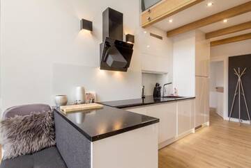 Фото номера Двухуровневые апартаменты Апартаменты Apartamenty Krzeptowskiego 2 Zakopane г. Закопане 33