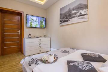 Фото номера Апартаменты с 2 спальнями Апартаменты Apartament Zakopiańskie Tarasy Zakopane г. Закопане 16