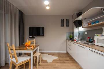 Фото номера Апартаменты Делюкс 2 Апарт-отели Bory6a Apartamenty г. Закопане 8