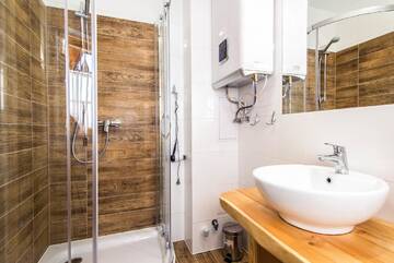 Фото номера Апартаменты с террасой Апартаменты Dom Tatra Apartamenty Zakopane г. Закопане 11