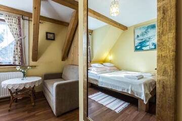 Фото номера Апартаменты с 2 спальнями и 2 ванными комнатами Апартаменты Apartamenty Szymaszkowa г. Закопане 21