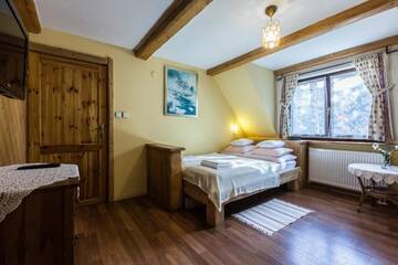 Фото номера Апартаменты с 2 спальнями и 2 ванными комнатами Апартаменты Apartamenty Szymaszkowa г. Закопане 22
