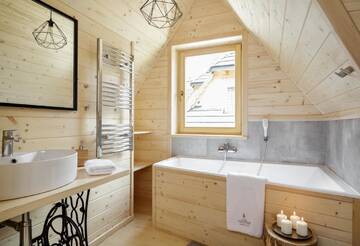 Фото номера Шале с двумя спальнями Шале Tatra Wood House г. Закопане 12