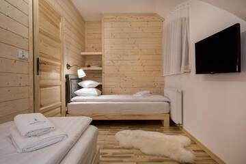 Фото номера Шале с 3 спальнями Шале Tatra Wood House г. Закопане 6