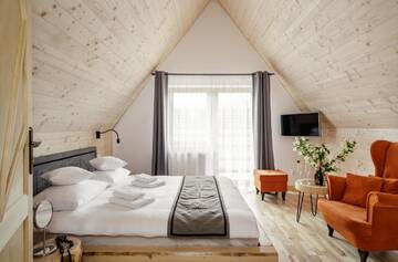 Фото номера Шале с двумя спальнями Шале Tatra Wood House г. Закопане 9