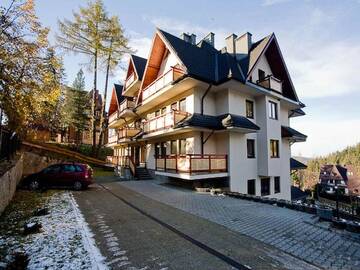 Фото номера Апартаменты с балконом Апартаменты Apartamenty Tatry - SKI&amp;SPA г. Закопане 38