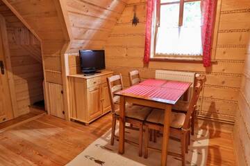 Фото номера Четырехместный номер Делюкс Апартаменты Apartamenty Tomusik г. Закопане 22