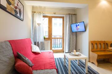 Фото номера Апартаменты с балконом Апартаменты Apartamenty Zakopane Orkana г. Закопане 7