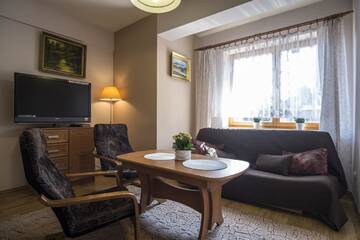 Фото номера Апартаменты с 1 спальней Апартаменты Apartamenty Zakopane Orkana г. Закопане 3