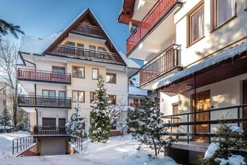 Фото номера Апартаменты с 2 спальнями Апартаменты Rent like home - Orkana г. Закопане 26