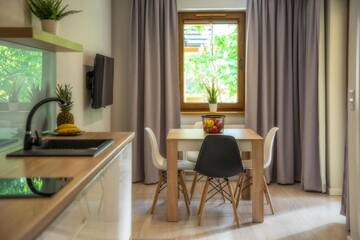 Фото номера Апартаменты с террасой Апартаменты Apartamenty Pod Gubałówką г. Закопане 4