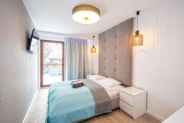 Фото номера Апартаменты с 1 спальней с диваном-кроватью. Апартаменты Apartamenty Pod Gubałówką г. Закопане 3