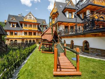 Фото номера Улучшенные апартаменты-студио Апартаменты TatryTop Zakopiańskie Tarasy Premium &amp; SPA г. Закопане 6
