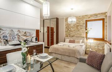 Фото номера Улучшенные апартаменты-студио Апартаменты TatryTop Zakopiańskie Tarasy Premium &amp; SPA г. Закопане 11