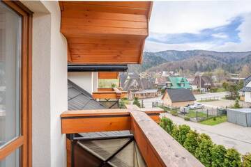 Фото номера Двухуровневые апартаменты Апартаменты Apartamenty Montana г. Закопане 20