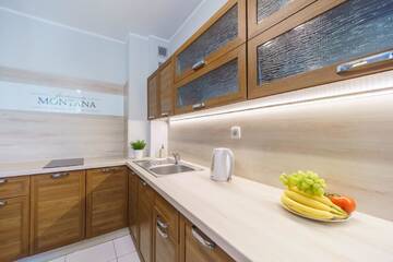 Фото номера Апартаменты с 1 спальней и балконом Апартаменты Apartamenty Montana г. Закопане 3