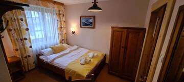 Фото номера Небольшой двухместный номер с 1 кроватью Апарт-отели Aparthotel Pod Nosalem г. Закопане 2