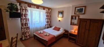 Фото номера Двухместный номер с 1 кроватью Апарт-отели Aparthotel Pod Nosalem г. Закопане 2