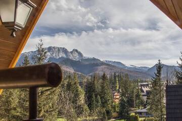 Фото номера Апартаменты с 2 спальнями и балконом Апартаменты Apartamenty Chata Pod Reglami Zakopane г. Закопане 6