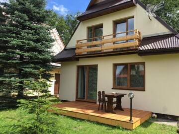 Фото номера Шале с 3 спальнями Шале Urocze domki Zakopane г. Закопане 26