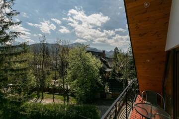 Фото номера Апартаменты с 2 спальнями и балконом Апартаменты VIP Apartamenty Widokowe г. Закопане 12