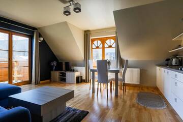 Фото номера Апартаменты с мини-кухней и балконом Апартаменты Domek za Strugiem - pokoje i apartamenty г. Закопане 12