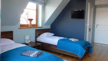 Фото номера Двухместный номер с 1 кроватью Апартаменты Domek za Strugiem - pokoje i apartamenty г. Закопане 4