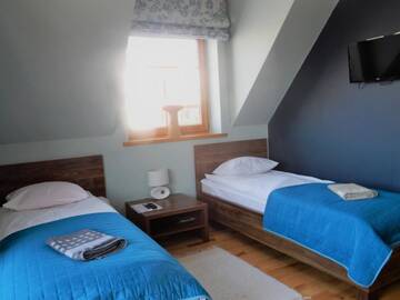 Фото номера Двухместный номер с 1 кроватью Апартаменты Domek za Strugiem - pokoje i apartamenty г. Закопане 6