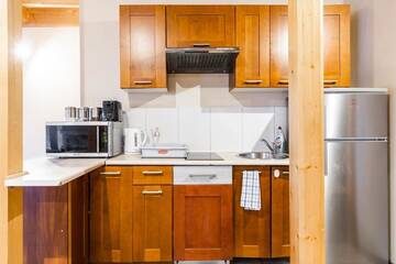 Фото номера Апартаменты с 4 спальнями Апартаменты Apartamenty Krupówki 24 г. Закопане 32