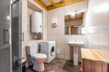 Фото номера Апартаменты с 4 спальнями Апартаменты Apartamenty Krupówki 24 г. Закопане 9