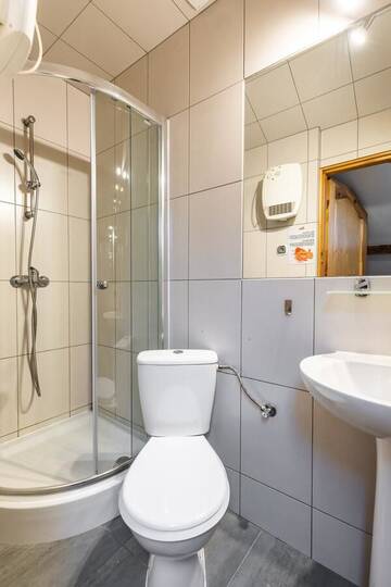 Фото номера Апартаменты с 4 спальнями Апартаменты Apartamenty Krupówki 24 г. Закопане 17