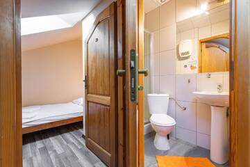 Фото номера Апартаменты с 4 спальнями Апартаменты Apartamenty Krupówki 24 г. Закопане 18