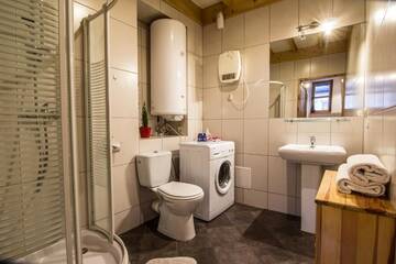 Фото номера Апартаменты с 4 спальнями Апартаменты Apartamenty Krupówki 24 г. Закопане 39