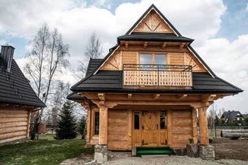Фото номера Шале с 3 спальнями Шале Domki na Wyskówkach г. Закопане 31