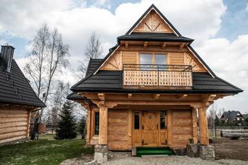 Фото номера Шале с 3 спальнями Шале Domki na Wyskówkach г. Закопане 13