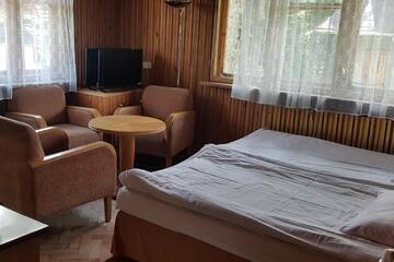 Фото номера Двухместный номер с 1 кроватью и общей ванной комнатой Проживание в семье Willa Końiczynka г. Закопане 7