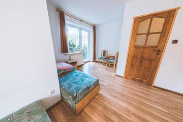 Фото номера Семейный номер с балконом Хостелы Hostel &amp; Apartments u Florka 2 г. Закопане 6
