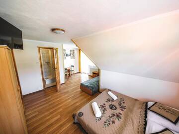 Фото номера Семейный номер с балконом Хостелы Hostel &amp; Apartments u Florka 2 г. Закопане 4
