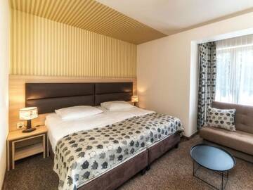 Фото номера Стандартный двухместный номер с 1 кроватью Отель Hotel Korona Tatr г. Закопане 2