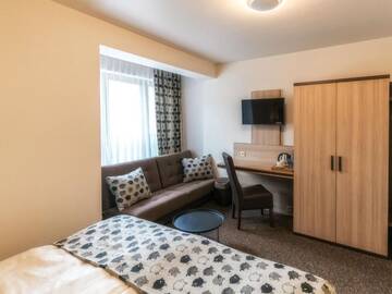 Фото номера Стандартный двухместный номер с 1 кроватью Отель Hotel Korona Tatr г. Закопане 5