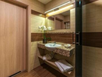 Фото номера Стандартный двухместный номер с 1 кроватью Отель Hotel Korona Tatr г. Закопане 7